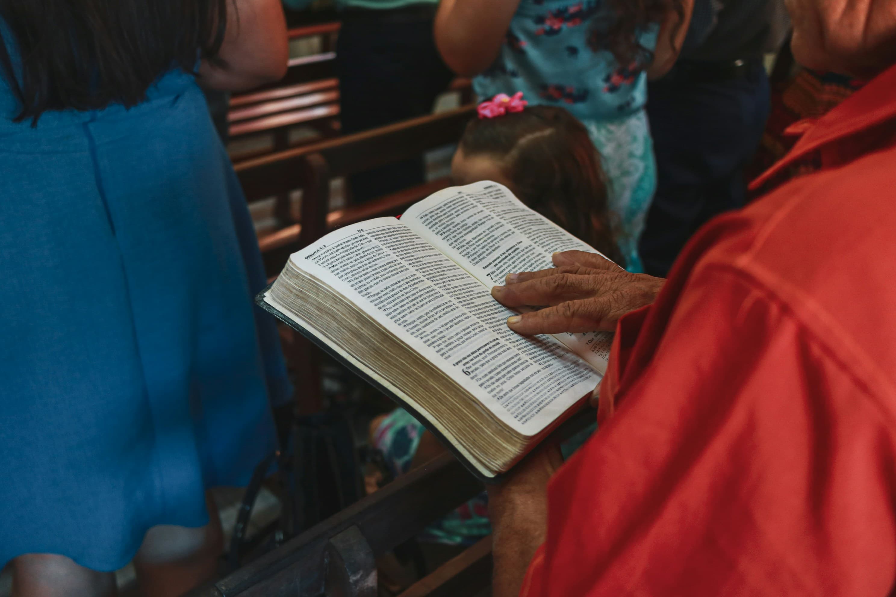 People reading the Bible together
